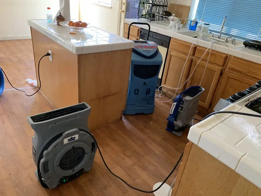 Water heater failure cleanup in a North Las Vegas garage