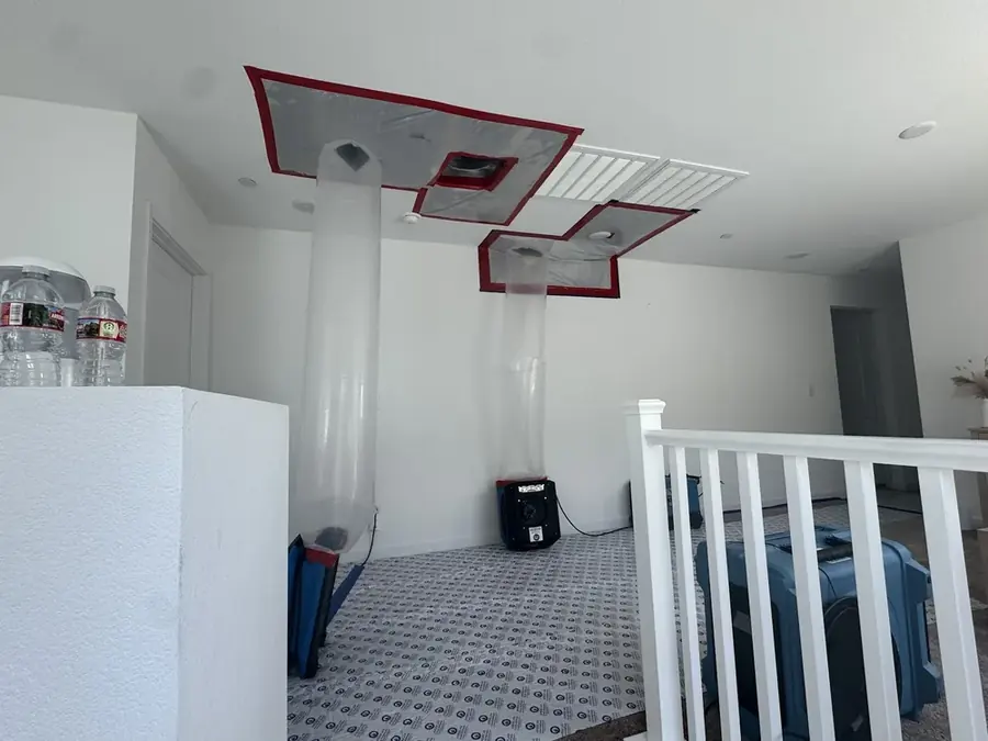 Air movers drying a Las Vegas ceiling after a swamp cooler leak