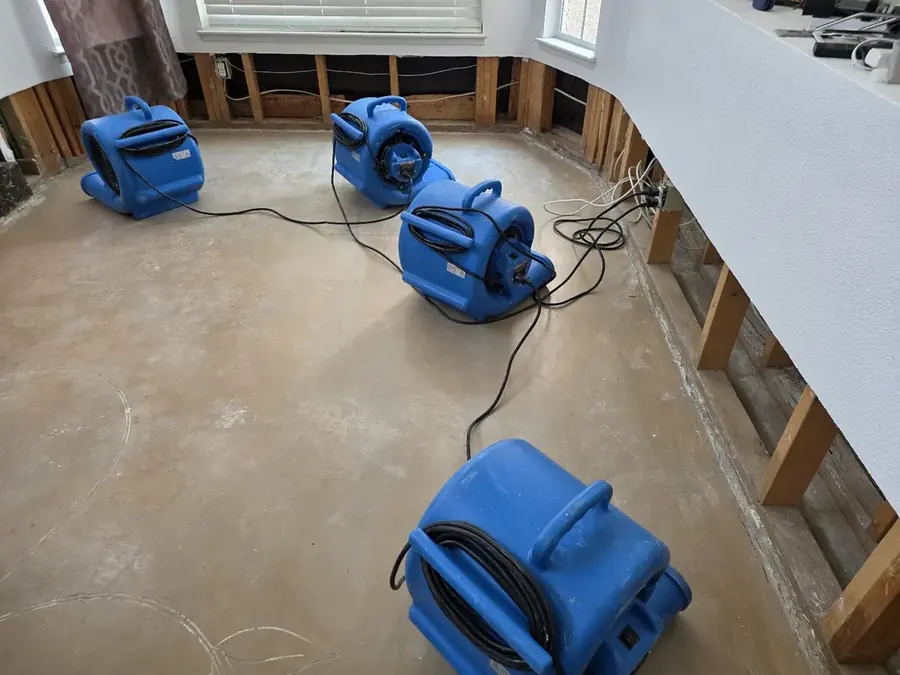 Air movers and dehumidifiers drying a Las Vegas home